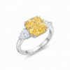 Fancy Vivid Yellow Radiant Cut Diamond Ring with Trillion Side Stones